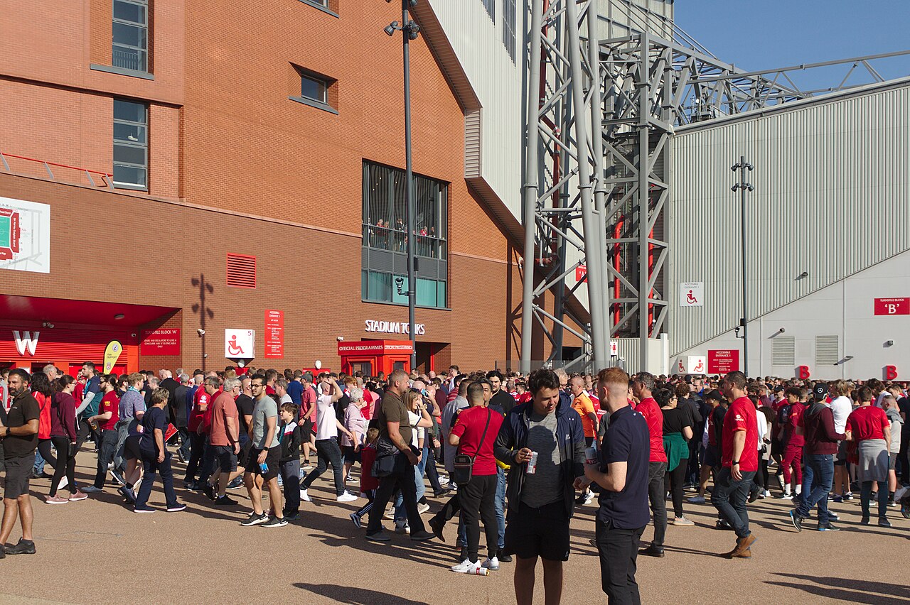 Football supporters outside Anfield stadium after a match